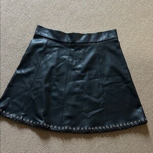 Dex Black Mini Skirt with Eyelet Accents